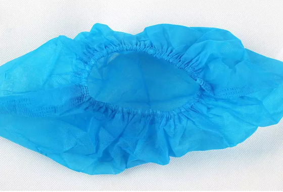 El zapato azul no tejido cubre la resbalón anti disponible Eco suave amistoso